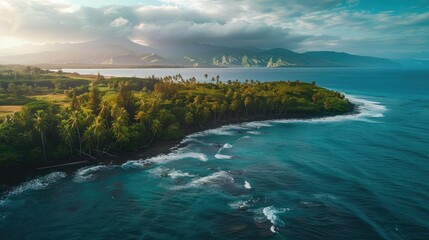 Wall Mural - Aerial view of a lush green coastline with turquoise waters, gentle waves, and mountains in the background under a cloudy sky.