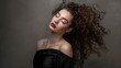 © The Little Hut - Beautiful woman portrait curly long hair beauty natural black dress gray background : Generative AI
