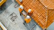 © ZeNDaY - Efficient Team of Roofers Replacing Damaged Tiles on Commercial Building: Aerial View of Organized Chaos