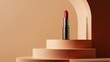 © Oranee  - Red lipstick on a minimalist beige podium, representing beauty products.