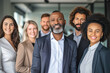 © Jelena - Group portrait of smiling business people