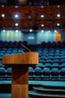 © Alexander Chaykin - A wooden podium with a microphone on top, ideal for presentations and speeches