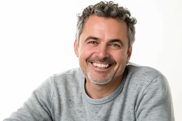 Wall Mural - Portrait of a happy caucasian man in his 40s smiling at the camera isolated in white background