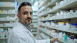 © Mariia Bu - Male middle eastern pharmacist checking inventory levels in pharmacy