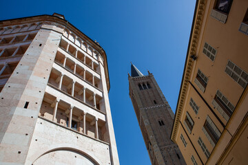 Urban cityscape of Parma, Italy, historic architecture and bustling streets