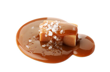 Wall Mural - Yummy candy with caramel sauce and sea salt isolated on white