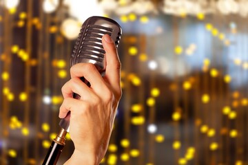 Sticker - Metal classic microphone on lights background