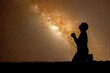 © STOCK PHOTO 4 U - Silhouette of Person Praying Under Starry Night Sky with Milky Way Galaxy in Background