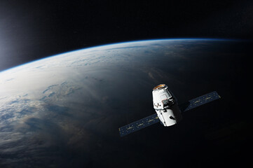 Wall Mural - planet earth with satellite launched into outer space. elements of this image furnished by nasa.