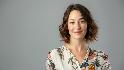 Wall Mural - Middle age beautiful business woman wearing glasses standing over isolated gray background looking to side, relax profile pose with natural face and confident smile.