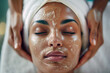 © Виктория Марьенко - Close up of a black woman having a facial massage in a spa