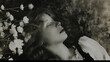 © Sean - Young girl sleeping peacefully in flowers black and white portrait