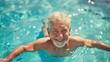 © Joyce - Portrait of a smiling senior male in water in pool