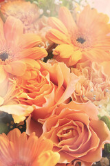 Wall Mural - beautiful flower bouquet in orange colors, close up floral background