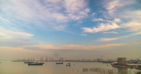 Wall Mural - Time-lapse Logistic shipping quay boat in twilight sky night Engineering crane depot at logistic export terminal control. Warehouse freight container yard quayside harbor port Logistics TimeLapse