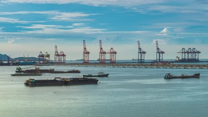 Wall Mural - Logistic shipping quay boat Engineering crane depot at logistic export terminal control. Warehouse freight background container yard loading quayside harbor port. Logistics seascape shipping portal