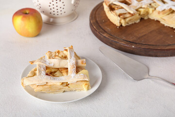 Wall Mural - Plate with piece of delicious apple pie on white background