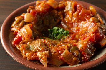 Wall Mural - A closeup view of a bowl of zaalouk.