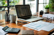 © Daniel - Office desk with financial reports a calculator