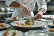 © Daniel - Professional chef preparing a gourmet dish