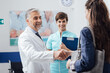 © StockPhotoPro - Medical staff welcoming a patient