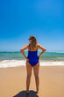 © Jacek Chabraszewski - Beautiful woman standing on sunny beach Portugal, Algarve, praia Armona