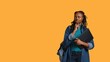 © DC Studio - Pensive woman carrying laptop, doing thinking gesture, memorizing information for school exam, studio background. Student holding notebook, remembering before university assessment, camera B