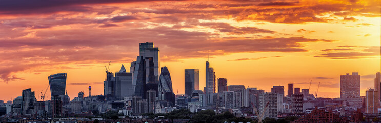 Wall Mural - Panorama of the urban London City skyline during a colorful summer sunset, England