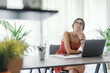 © StockPhotoPro - Woman sitting at desk and thinking