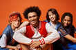 © LIGHTFIELD STUDIOS - A group of young multicultural friends, including a nonbinary person, sitting together in stylish attire in a studio setting.