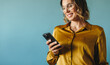 © Jacob Lund - Business woman receiving communication from her associates on a smartphone