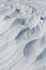 Wall Mural - white snow texture background pattern in winter landscape