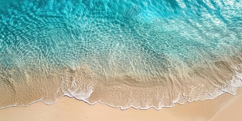 Wall Mural - Clear Turquoise Water Laps Against Sandy Shore