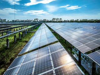 Wall Mural - Solar panels at power station. Green energy technology background