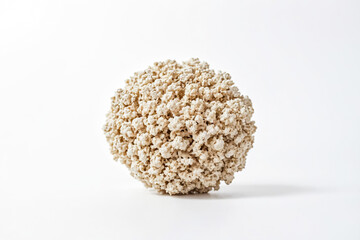 Canvas Print - Close-up of a White Popcorn Ball on a White Background