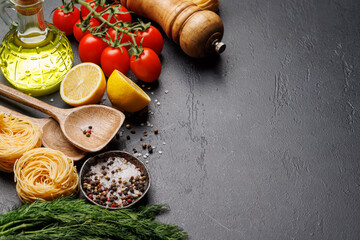 Poster - Cooking scene: Cherry tomatoes, pasta, spices on table