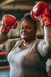 © ADDICTIVE STOCK - Confident female boxer posing with red gloves in a gym. Generative AI image