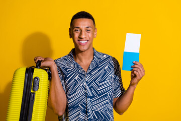 Sticker - Photo of funky cool guy dressed print shirt holding baggage passport isolated yellow color background