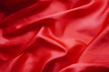 Wall Mural - Texture red satin or silk is beautiful and luxurious (blurred).