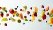 © ORG - Food concept, fresh cut mixed fruits floating on white background.