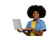 © Edson Souza - woman holding laptop computer typing on keyboard looking at camera, black woman