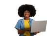 © Edson Souza - woman holding laptop computer typing on keyboard looking at camera, black woman