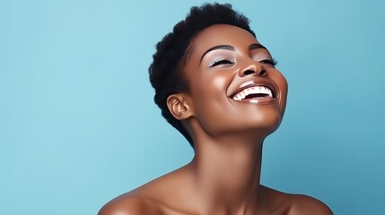 Beautiful, sexy, happy smiling dark-skinned African American woman with perfect skin and short haircut, on a light blue background, banner.