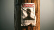 © KAI - Weathered Missing Person Poster on Wooden Pole with Blurred Photo and Burned Edges International day of the Disappeared