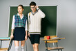 © LIGHTFIELD STUDIOS - Elegant man and woman posing in front of green board in college.