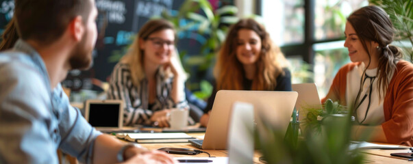 Group of office workers gather around a table to do research and implement new ideas. Business people discussing in board room meeting