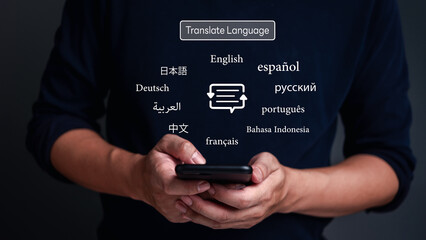 Hands holding smartphone with multilingual text icons. Translation technology concept. App for communication, international interaction. Digital language service.