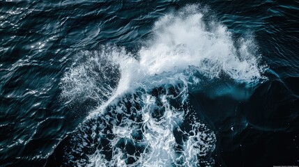 Wall Mural - aerial top view background photo of ocean sea water white wave splashing in the deep sea