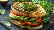 © spyrakot - Gourmet Avocado and Roasted Vegetable Sandwich with Grilled Veggies and Pesto on Ciabatta Bread