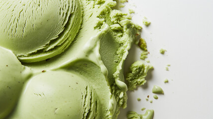 Velvety pistachio sorbet, a closeup image of velvety pistachio sorbet, its rich green color and smooth texture highlighted against a pure white background